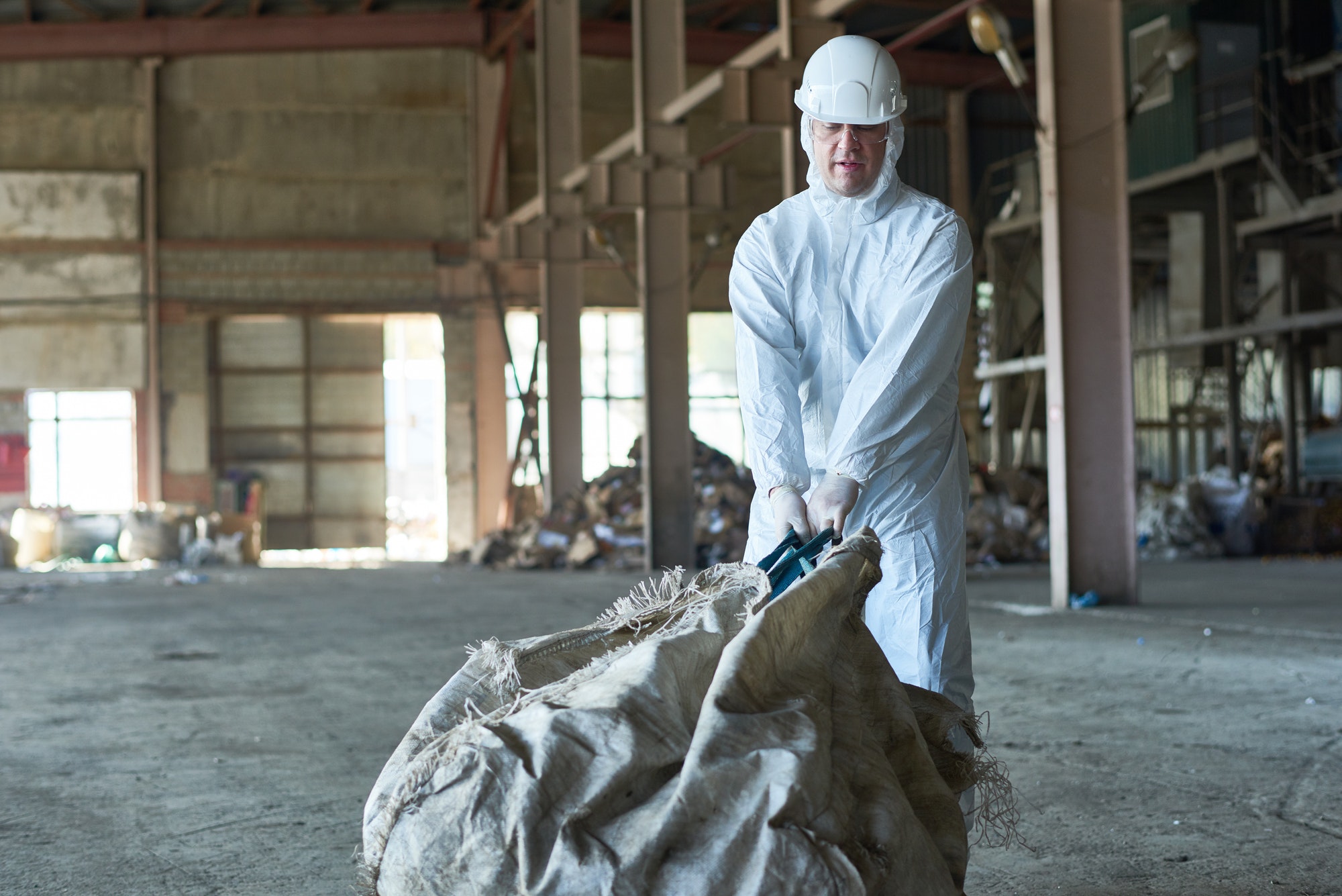 Worker on Recycling Factory